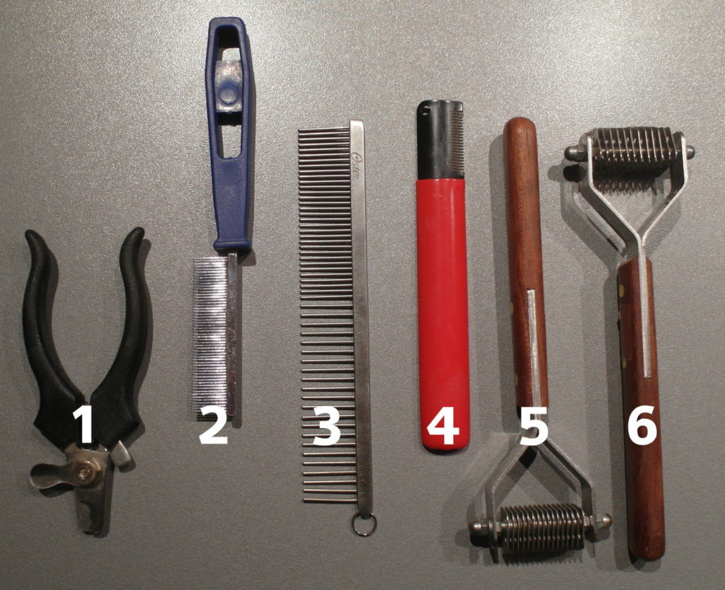 1. Krallenschere, 2. feiner Kamm für Katzenfell, 3. Frisierkamm, 4. Trimm-Messer, 5. Coat King grob, 6. Coat King fein